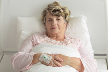 Elder woman with IV drip