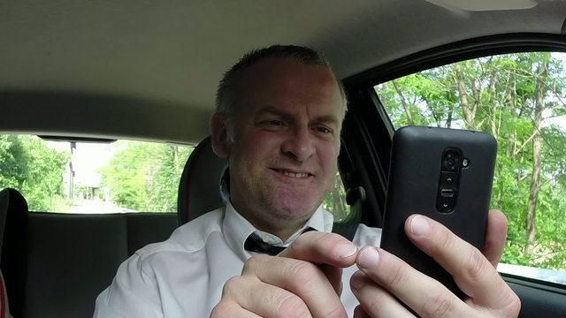 Car Driver Using Smartphone For Email Internet Driving Car