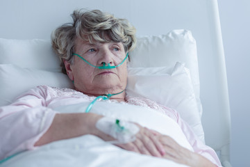 Female senior with nasal cannula