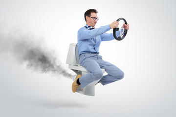 Funny businessman flying on the toilet