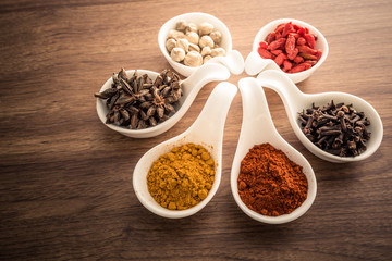 Wooden table of colorful spices