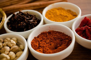 Wooden table of colorful spices