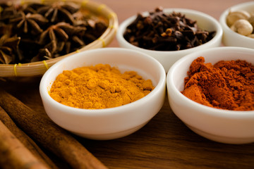Wooden table of colorful spices