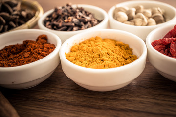 Wooden table of colorful spices