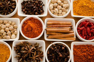 Wooden table of colorful spices