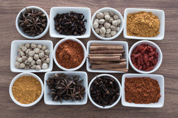 Wooden table of colorful spices