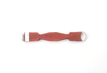 Coconut grater on the white background