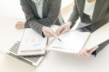 Business people discussing the charts and graphs showing the res