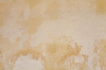Old yellow paint cement wall