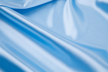 Fototapeta premium Blue silk drapery. 
