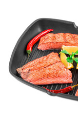 Fried salmon steak on pan. 
