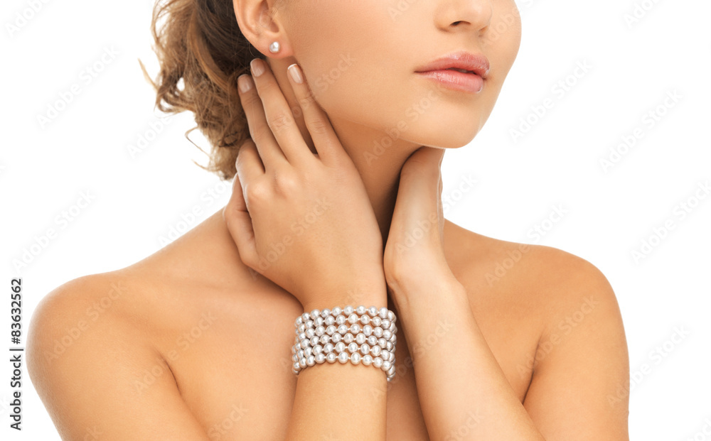 Poster beautiful woman with pearl earrings and bracelet