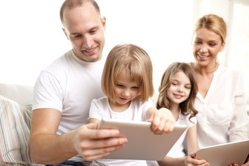 happy family with tablet pc computers at home