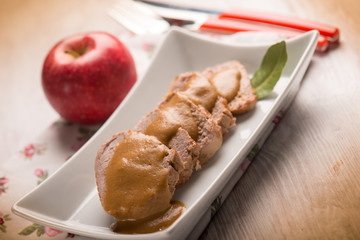 tenderloin with apple cream sauce, selective focus