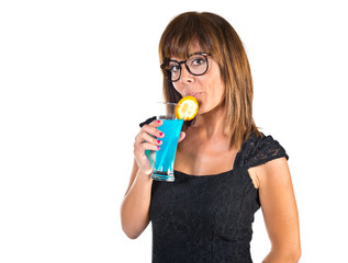 Woman drinking a cocktail