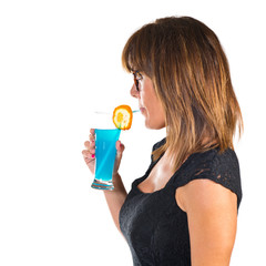 Woman drinking a cold cocktail