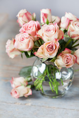 Bouquet of pink beautiful roses in vase