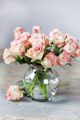 Bouquet of pink beautiful roses in vase