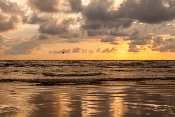 Obraz premium Dramatic sunset with heavy clouds over Baltic.