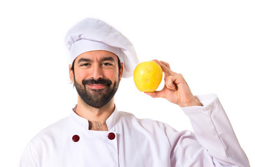 Chef holding an apple