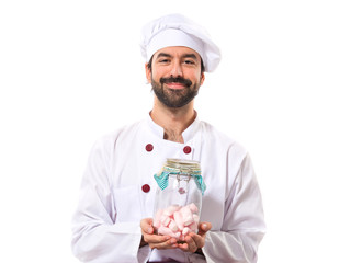 Chef holding sweetmeats