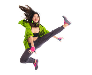 Teenager girl jumping in street dance style