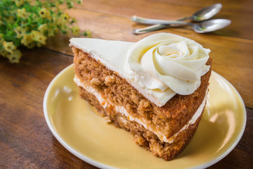 Slice of carrot cake on plate