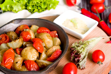 Baked potatoes, tomatoes, 