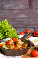 Baked potatoes, tomatoes, 