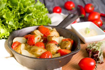 Baked potatoes, tomatoes, 