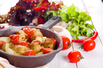 Baked potatoes, tomatoes, 