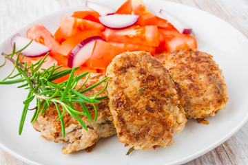 Fried pork chop with tomato salsa