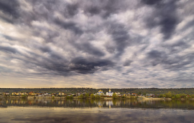 Fototapeta premium dark clouds river.