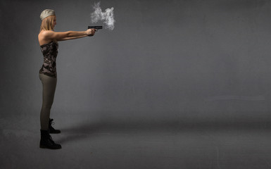 Obraz na płótnie Canvas soldier aiming with gun