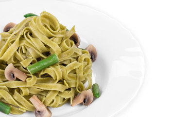 Pasta tagliatelle with green peas and ham.