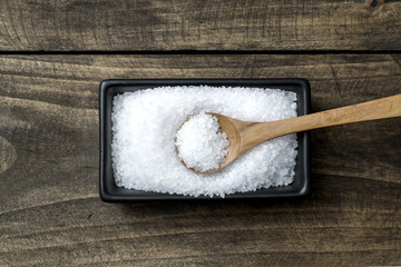 sea salt in  bowl and spoon