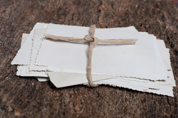 bunch of old photos on a wooden background