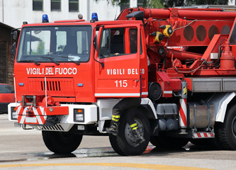 Red fire trucks with huge crane