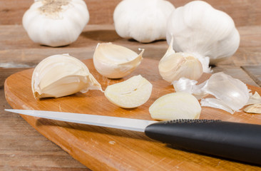 White garlic bulbs and cloves