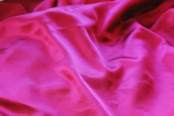background texture of shiny red silk