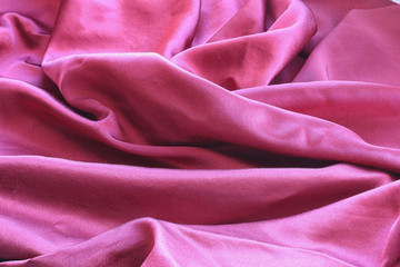 Fototapeta premium background texture of shiny red silk