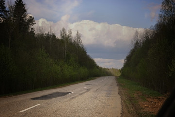 Fototapeta premium rural landscape road stretches into the distance