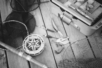 a set of fisherman on a wooden background