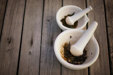 mixing grinding spices in a mortar