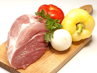Raw fresh meat on board with condiments on white background