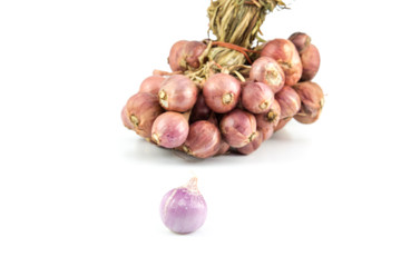 Shallot onions in a group isolated on white background