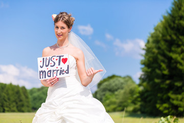 Bride as hitchhiker - wedding concept
