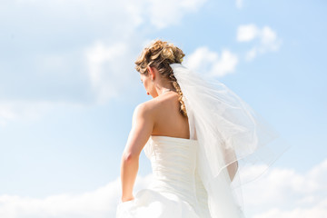Bride in gown with bridal veil
