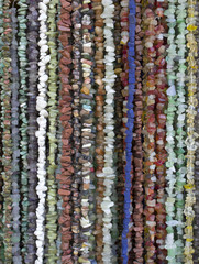 Many necklaces of semiprecious stones