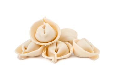 Group of raw ravioli on a white background